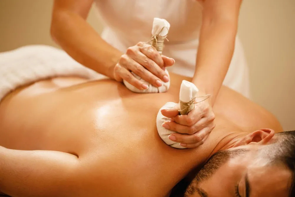 Abhyangam with Choorna Swedam at Zacs Valley ayurveda wellness