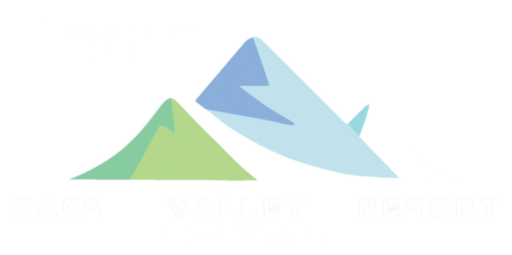 White logo of Zacs Valley Resort, Kodaikanal